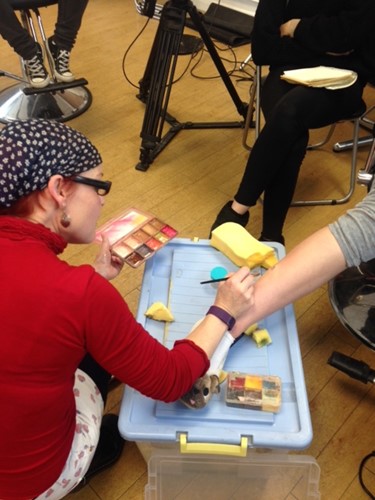 applying wound makeup